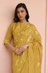 Vaayu_Yellow Muslin, Cotton Embroidery Round Neck Rue Thread Saree With Blouse _Online_at_Aza_Fashions