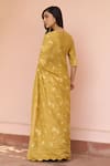 Shop_Vaayu_Yellow Muslin, Cotton Embroidery Round Neck Rue Thread Saree With Blouse _at_Aza_Fashions