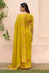 Shop_Vaayu_Yellow Muslin, Cotton Embroidery V-neck Marigold Saree With Blouse _at_Aza_Fashions