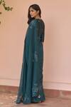 Shop_Vaayu_Green Muslin, Cotton Embroidery, Tassels Round Neck, Jade Saree With Blouse _at_Aza_Fashions