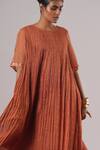 Shop_Urvashi Kaur_Orange Brocade, Silk Round Neck Echo Micro Pleated Woven Dress _Online_at_Aza_Fashions