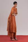 Urvashi Kaur_Orange Tissue, Silk Zari Round Neck Mira Textured Woven Tunic _Online_at_Aza_Fashions