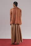 Buy_Urvashi Kaur_Beige Ramie, Linen Mascon Pleated Wide-legged Trousers _Online_at_Aza_Fashions