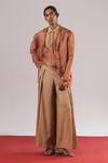 Buy_Urvashi Kaur_Beige Ramie, Linen Mascon Pleated Wide-legged Trousers _at_Aza_Fashions