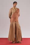 Shop_Urvashi Kaur_Beige Ramie, Linen Mascon Pleated Wide-legged Trousers _Online_at_Aza_Fashions
