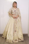 Buy_Label Deepshika Agarwal_Ivory Tissue Embroidery V-neck Hand Lehenga Set _at_Aza_Fashions