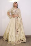 Label Deepshika Agarwal_Ivory Tissue Embroidery V-neck Hand Lehenga Set _Online_at_Aza_Fashions