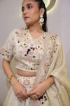 Shop_Label Deepshika Agarwal_Ivory Tissue Embroidery V-neck Hand Lehenga Set _Online_at_Aza_Fashions