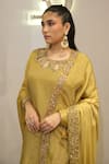 Label Deepshika Agarwal_Yellow Tissue Embroidery, Tassels, Zari Round Neck Hand Kurta Palazzo Set _at_Aza_Fashions