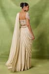 Shop Awigna Ivory Silk Sequins, Beads, Tassels Zahira Embroidered Blouse And Draped Saree Set at Aza Fashions Shop_Awigna_Ivory Silk Sequins, Beads, Tassels Zahira Embroidered Blouse And Draped Saree Set _at_Aza_Fashions