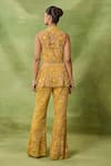 Shop_Awigna_Yellow Net Embroidery, Beads, Sequins V-neck, Emerald Peplum Top And Pant Set _at_Aza_Fashions