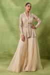 Awigna_Ivory Organza, Net Embroidery, Sequins, Beads Maya Peplum Top Sharara Set _Online_at_Aza_Fashions
