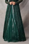 Awigna_Green Organza, Net Embroidery, Sequins Open Neck, Zircon Long Jacket Skirt Set _Online_at_Aza_Fashions