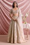 Buy_Parshya_Ivory Chiffon Zari, Embroidery, Sequins, Banarasi Floral Woven Lehenga Set _at_Aza_Fashions