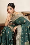 Shop Zal From Benaras Green Silk Zari, Sequins, Fringe Banarasi Saree With Unstitched Blouse Piece Online at Aza Fashions Shop_Zal From Benaras_Green Silk Zari, Sequins, Fringe Banarasi Saree With Unstitched Blouse Piece _Online_at_Aza_Fashions