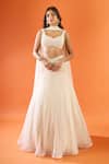 Buy Couture By Niharika Ivory Net Pearls, Stones Sweetheart Neck Embroidered Lehenga Set at Aza Fashions Buy_Couture By Niharika_Ivory Net Pearls, Stones Sweetheart Neck Embroidered Lehenga Set _at_Aza_Fashions