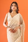 Buy_COUTURE BY NIHARIKA_Ivory Embroidery, Sequins V-neck Saree With Blouse _Online_at_Aza_Fashions