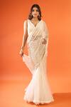 Shop_COUTURE BY NIHARIKA_Ivory Embroidery, Sequins V-neck Saree With Blouse _Online_at_Aza_Fashions