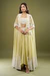Buy Anamika Khanna Green Embroidery, Sequins Open , Square Cape Draped Skirt Set at Aza Fashions Buy_Anamika Khanna_Green Embroidery, Sequins Open , Square Cape Draped Skirt Set _at_Aza_Fashions