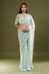 Buy_COUTURE BY NIHARIKA_Blue Net Embroidery, Beads Round Neck Saree With Blouse _at_Aza_Fashions