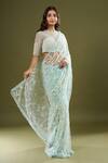 COUTURE BY NIHARIKA_Blue Net Embroidery, Beads Round Neck Saree With Blouse _at_Aza_Fashions