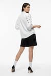 Shop Studio Moda India White Cotton Collared Embellished Eyelet U-hem Shirt at Aza Fashions Shop_Studio Moda India_White Cotton Collared Embellished Eyelet U-hem Shirt _at_Aza_Fashions