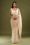 Buy_COUTURE BY NIHARIKA_Beige Pearls, Sequins V-neck Embroidered Saree With Blouse _at_Aza_Fashions