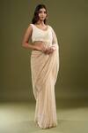COUTURE BY NIHARIKA_Beige Pearls, Sequins V-neck Embroidered Saree With Blouse _Online_at_Aza_Fashions