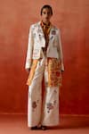 Buy Jajaabor Ivory Denim, Silk, Chanderi Embroidery Collared Biker Jacket And Pant Set at Aza Fashions Buy_Jajaabor_Ivory Denim, Silk, Chanderi Embroidery Collared Biker Jacket And Pant Set _at_Aza_Fashions