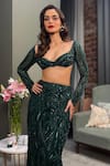 Buy_Diyarajvvir_Green Tulle Sequins Sweetheart Neck Embellished Blouse With Slit Skirt 