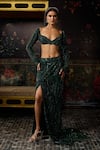 Shop_Diyarajvvir_Green Tulle Sequins Sweetheart Neck Embellished Blouse With Slit Skirt 