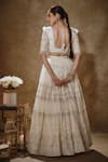 Shop_Renee label_Ivory Net Sequins, Stones, Ekasha Embroidered Soft Lehenga Set With Dupatta _at_Aza_Fashions