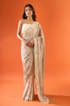 Buy_Nakul Sen_Beige Sequins, Tassels Embroidered Saree With Unstitched Blouse Piece _at_Aza_Fashions