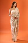Buy_Nakul Sen_Beige Sequins, Tassels Embroidered Saree With Unstitched Blouse Piece 