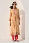 Buy_Swatti Kapoor_Peach Chanderi, Cotton Beads, Fringe Round Neck Mira Handwoven Kurta _at_Aza_Fashions