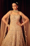 Shop_Label Moni K_Gold Organza, Net Embroidery, Sequins, Beads, Pearls, Noorie Corset Lehenga Set _Online_at_Aza_Fashions