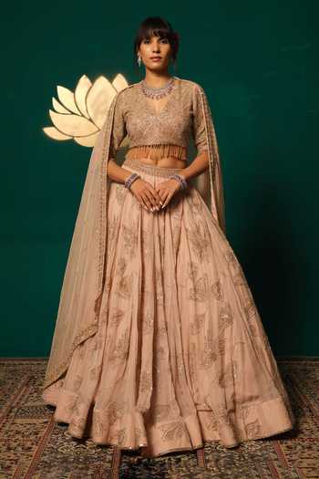 Shop_Niloufer By Aasif Ally_Peach Tissue Sequins, Tassels, Cut Work V-neck Cutdana Sequence Lehenga Set _Online_at_Aza_Fashions