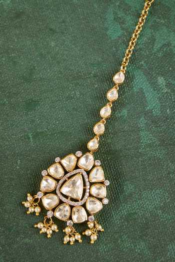 Shop_Kaari_White Pearls, Stones Ragini Gold Plated Vellore Maang Tikka _at_Aza_Fashions
