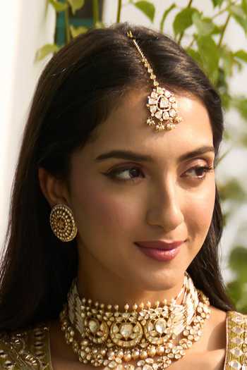 Shop_Kaari_White Pearls, Stones Ragini Gold Plated Vellore Maang Tikka _Online_at_Aza_Fashions