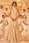 Shop_Seema Gujral_Beige Net Embroidery, Sequins, Pearls Halter Neck Abstract Gown _Online_at_Aza_Fashions