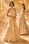 Seema Gujral_Beige Net Embroidery, Sequins, Pearls Halter Neck Abstract Gown _at_Aza_Fashions