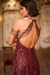 Seema Gujral_Maroon Net Sequins, Tassels Halter Neck Embellished Gown _Online_at_Aza_Fashions