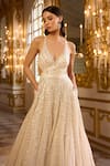 Seema Gujral_Ivory Net Sequins Plunge Neck Embellished Gown _at_Aza_Fashions