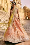 Buy_Anushree Reddy_Orange Organza Embroidery, Sequins V-neck Kamya Floral Bridal Lehenga Set _at_Aza_Fashions