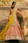 Shop_Anushree Reddy_Orange Organza Embroidery, Sequins V-neck Kamya Floral Bridal Lehenga Set _Online_at_Aza_Fashions