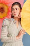 Parul And Preyanka_Green Crepe, Net, Lace Sequins, Fabric Flowers V-neck Almond Blaire Dress _at_Aza_Fashions
