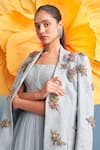 Parul And Preyanka_Blue Crepe, Net, Lace Applique, Fabric Flowers Charlotte Jacket Skirt Set _at_Aza_Fashions