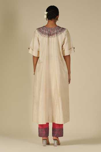 Shop_LATHA PUTTANNA_Ivory Silk Beads Round Neck, Yes Raw Asymmetric Kurta And Pant Set _at_Aza_Fashions