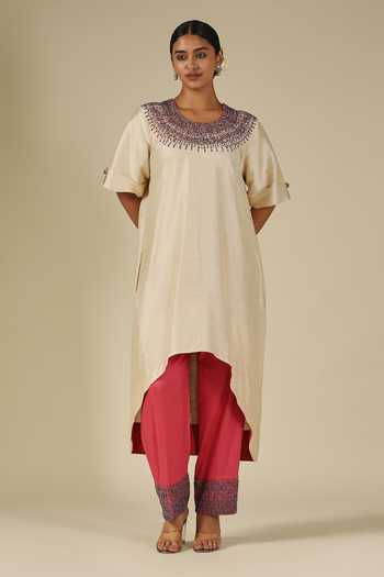 LATHA PUTTANNA_Ivory Silk Beads Round Neck, Yes Raw Asymmetric Kurta And Pant Set _at_Aza_Fashions