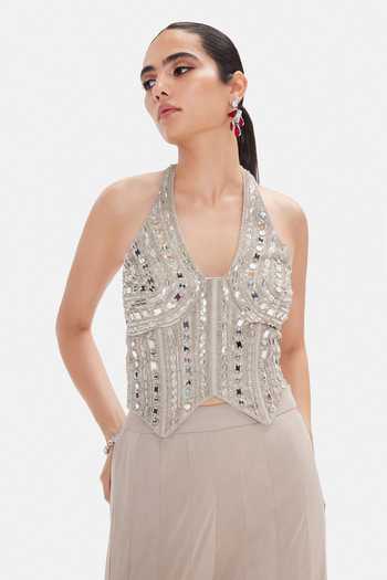 Basanti Kapde aur Koffee_Silver Silk, Lycra Sequins, Beads, Mirrors Halter Minimalist Flare Sharara Set _at_Aza_Fashions